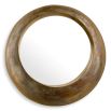 Vintage brass round mirror boasting sleek circular form