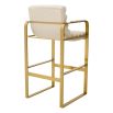 Cream linen upholstered bar stool with horizontal fluting and brass frame