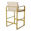 cream linen upholstered counter stool with horizontal fluting and brass frame