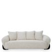 A luxury sofa by Eichholtz with a stunning grey upholstery and modern design
