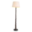 Bronze highlight finish floor lamp with layered silhouette completed with a shade