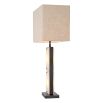 alabaster and bronze finish, with light warmly diffusing through the base for an inviting glow
