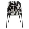 Dining chair with black and white abstract design and black legs