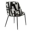 Dining chair with black and white abstract design and black legs