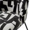 Dining chair with black and white abstract design and black legs