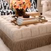 Classic opulent style ottoman with a tasseled base