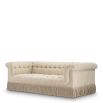 Classic opulent style sofa with a tasseled base