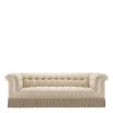 Classic opulent style sofa with a tasseled base
