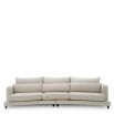 A luxury sofa by Eichholtz with a grey upholstery and modern design