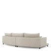 A luxury sofa by Eichholtz with a grey upholstery and modern design