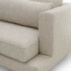 A luxury sofa by Eichholtz with a grey upholstery and modern design