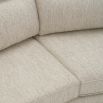 A luxury sofa by Eichholtz with a grey upholstery and modern design