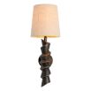 Wall lamp with angular silhouette and linen shade