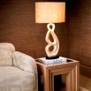 Elegant lamp with curved white ceramic frame