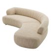 Elegant slightly curved sofa in boucle cream finish