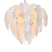 Inspired by the banana tree, the Saint Lucia Chandelier blends ceramic and textured glass, creating a unique and elegant focal point.