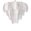 Inspired by the banana tree, the Saint Lucia Chandelier blends ceramic and textured glass, creating a unique and elegant focal point.