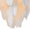 Inspired by the banana tree, the Saint Lucia Chandelier blends ceramic and textured glass, creating a unique and elegant focal point.