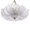 The Cabrillo Chandelier combines textured glass and an antique brass finish, offering a timeless and sophisticated statement for your interior.