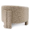 Stylish chair with curved back in luscious leopard print