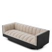 Upholstered sofa with fluted seating and black wood encompassing edge