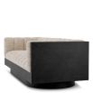 Upholstered sofa with fluted seating and black wood encompassing edge