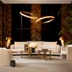 Slightly curved off-white sofa with sleek black feet.