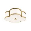 A luxurious aged brass and white glass ceiling lamp