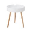 A chic white side table with natural-toned legs 