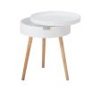 A chic white side table with natural-toned legs 