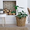 A chic white side table with natural-toned legs 