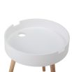 A chic white side table with natural-toned legs 