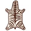 A playful and colourful flatweave rug with a vibrant zebra print