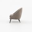 A stylish 70s inspired armchair with a luxury upholstery and angled legs