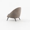 A stylish 70s inspired armchair with a luxury upholstery and angled legs