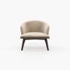 A chic, Mid-Century inspired armchair with two materials and contrasting black ash legs  