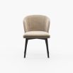 A luxurious dining chair upholstered in two sumptuous fabrics by Laskasas