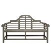Ornate outdoor bench with curved detailing in grey finish