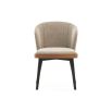 A luxurious dining chair with a caramel, leather back by Laskasas