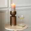 Elevate your decor with the Floure Candle Holder - S. Its elegant design adds a touch of sophistication to any space while beautifully showcasing your candles.