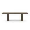 A luxurious minimal dining table in a grey eucalyptus finish