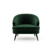 A luxurious retro-style velvet armchair with upholstered wooden legs by Laskasas