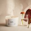 A luxurious joyful candle with a neroli, orange blossom and ylang ylang scent
