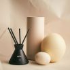 An aromatic 100% natural room diffuser with cotton reeds