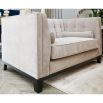 ex-display armchair in grey upholstery with fluting and deep stitching details