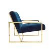 A modern navy lounge chair with a polished brass frame