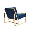 A modern navy lounge chair with a polished brass frame