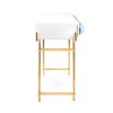 A futuristic white console table with blue acrylic cabochons and a polished brass base 