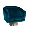 A luxurious blue velvet swivel chair with brushed stainless steel base