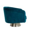 A luxurious blue velvet swivel chair with brushed stainless steel base